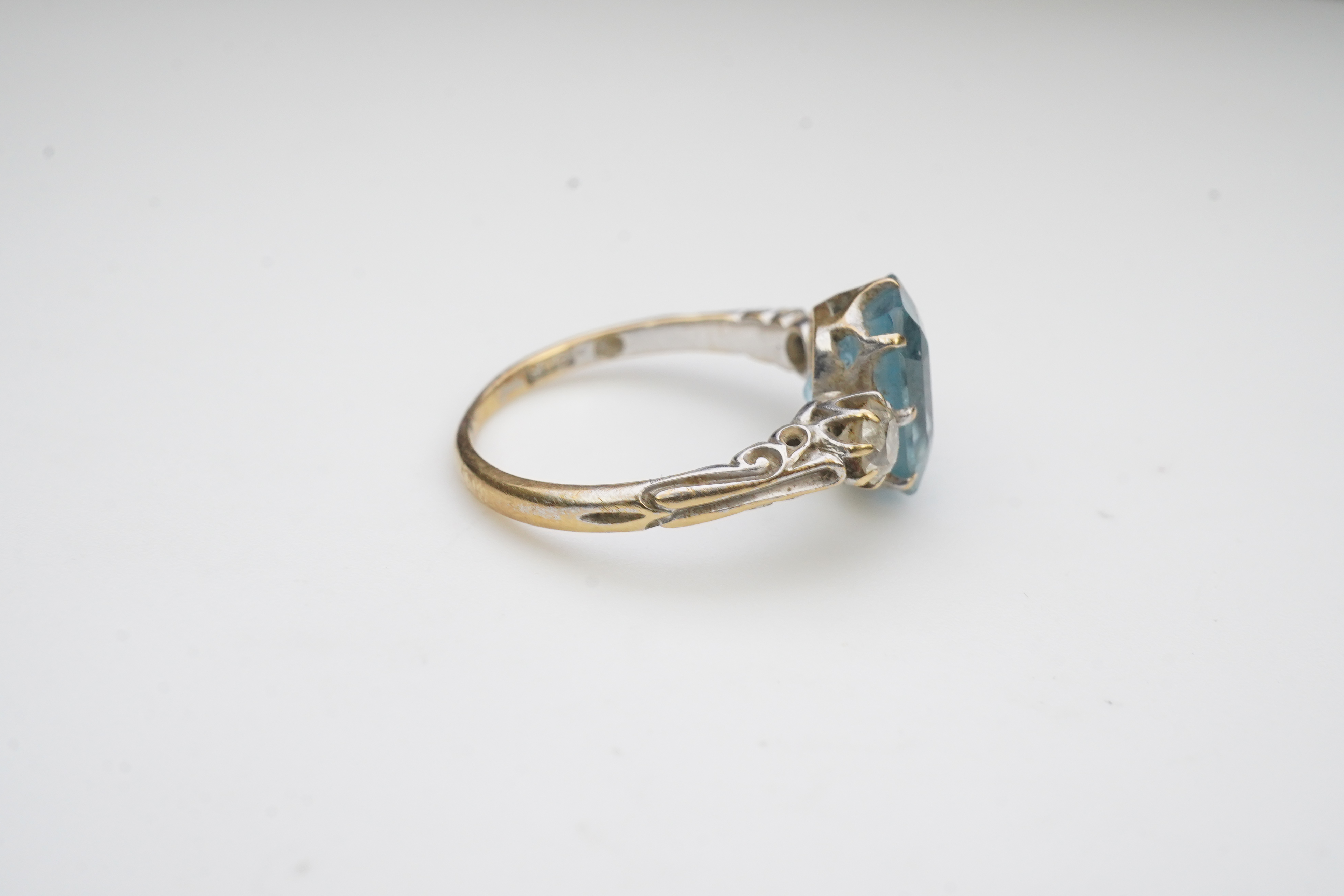 An aquamarine and diamond ring, early 20th century